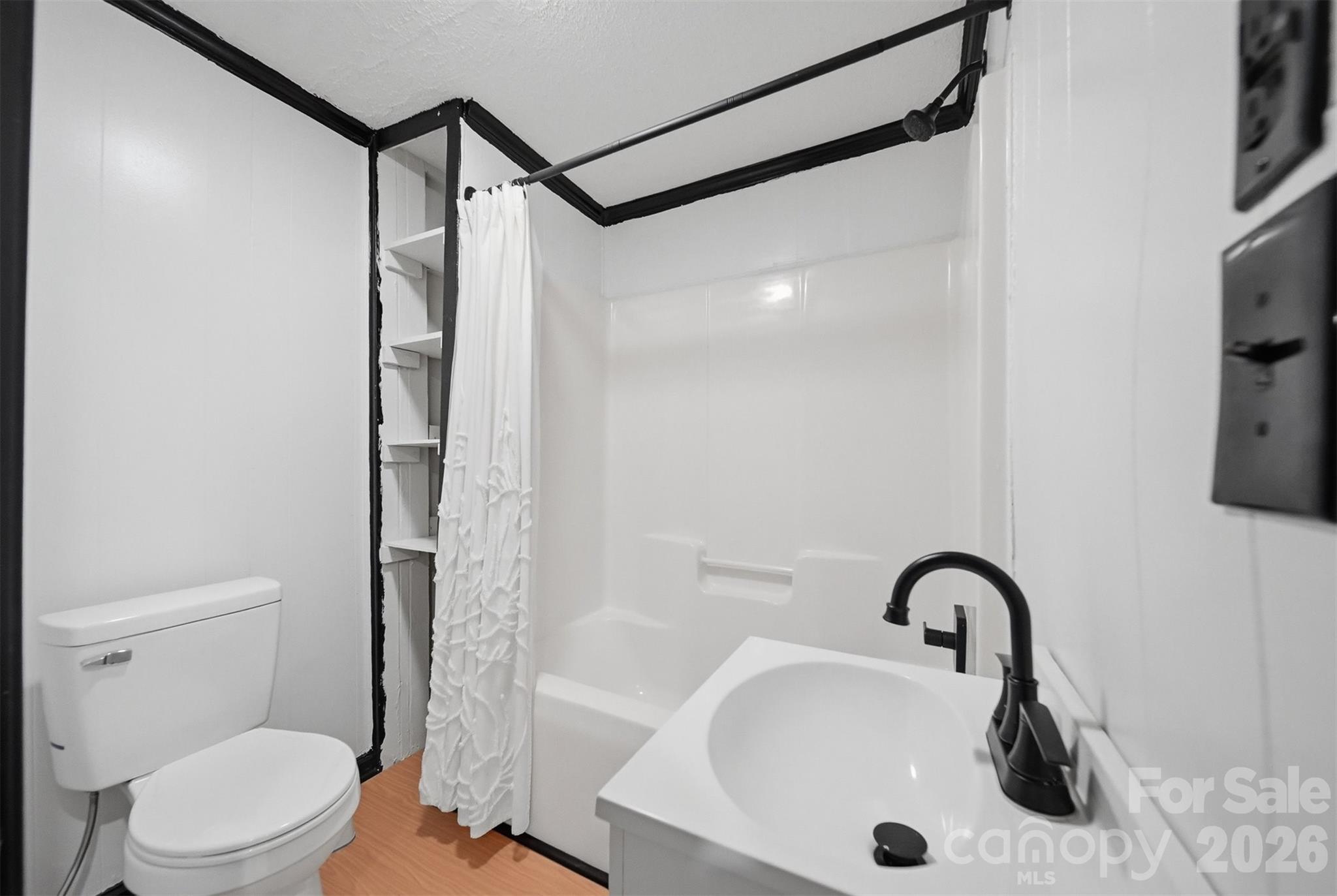 201 Cape Hickory Road Hickory, NC 28601 - Photo 13 of 16 a bathroom with a sink toilet and shower