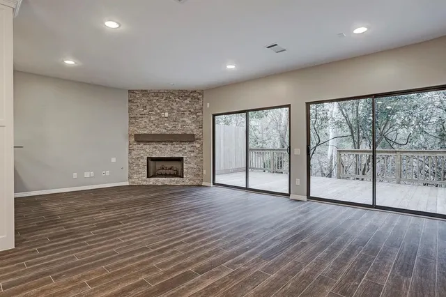 a bathroom with a granite countertop sink a mirror and vanity