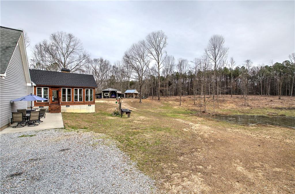 452 Terry White Road Aragon, GA 30104 - Photo 14 of 55 a view of swimming pool with a yard and sitting area
