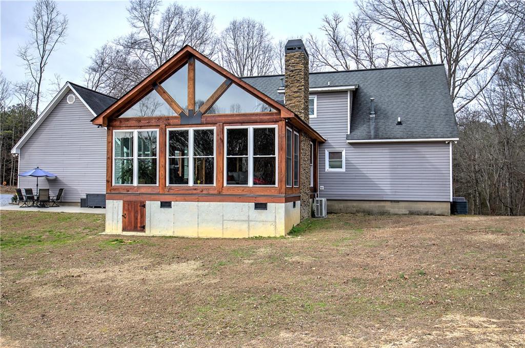 452 Terry White Road Aragon, GA 30104 - Photo 19 of 55 a front view of a house with garden