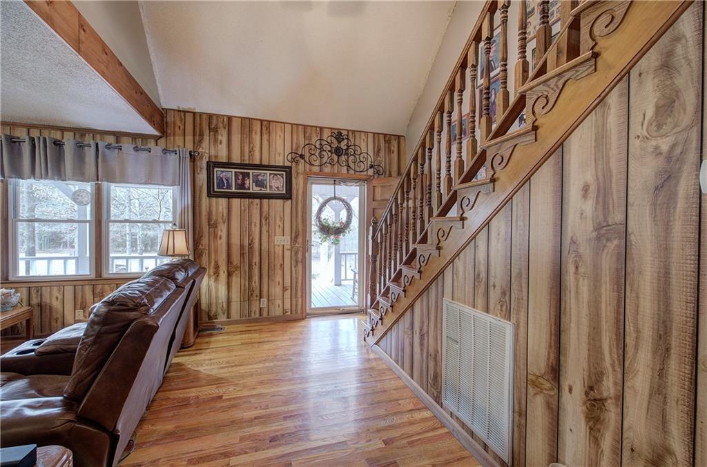 452 Terry White Road Aragon, GA 30104 - Photo 25 of 55 a view of a hallway with wooden floor and staircase
