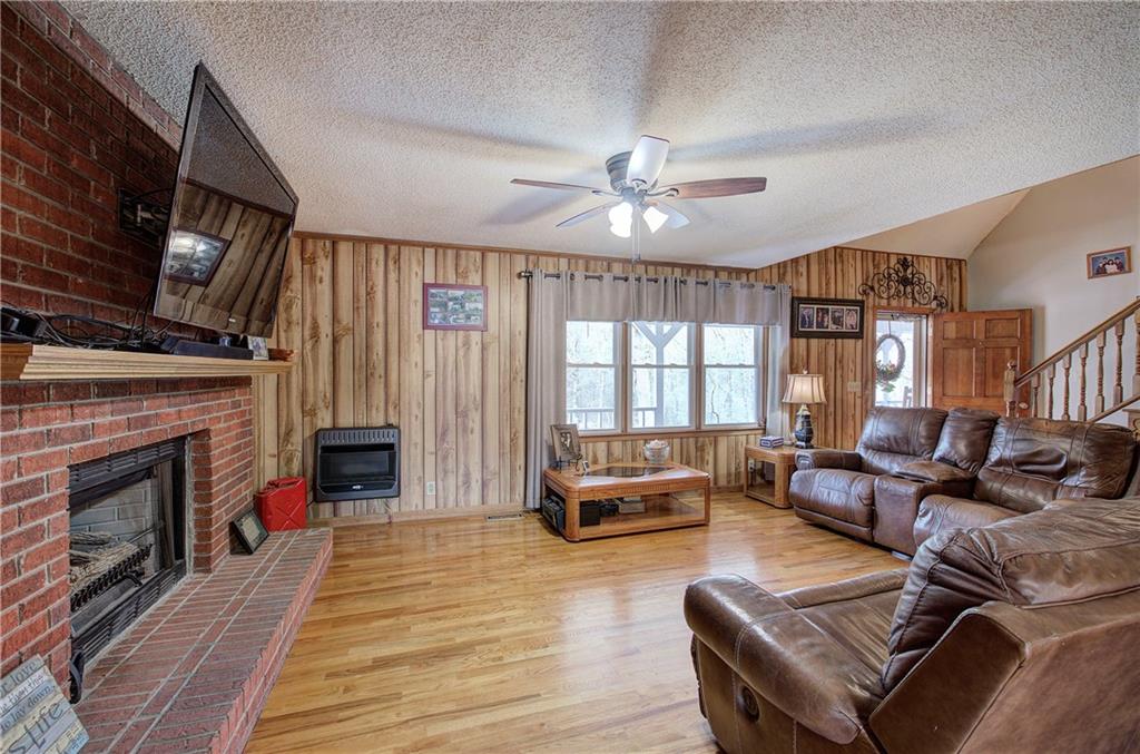 452 Terry White Road Aragon, GA 30104 - Photo 26 of 55 a living room with furniture fireplace and flat screen tv