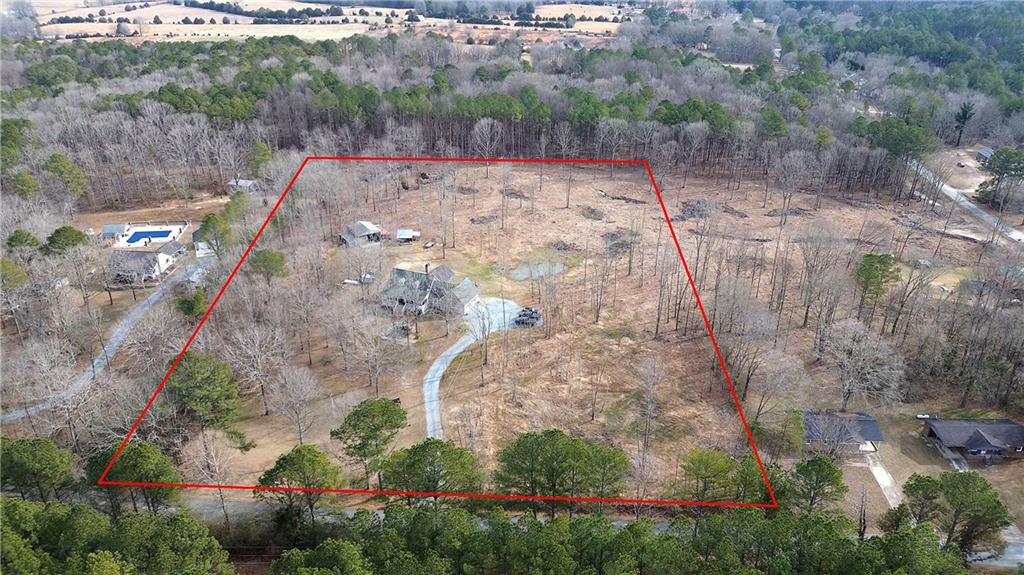 452 Terry White Road Aragon, GA 30104 - Photo 3 of 55 an aerial view of a house with a yard and large trees