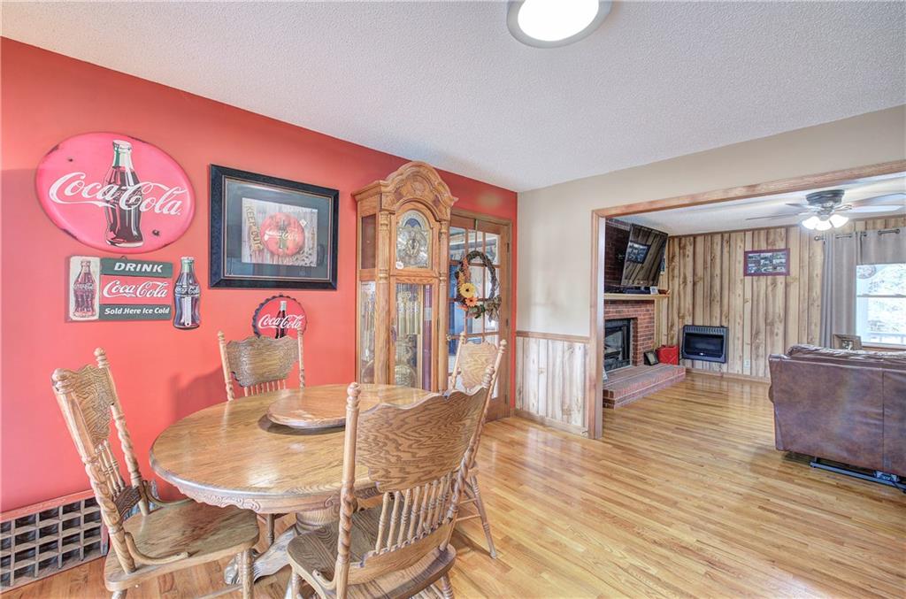 452 Terry White Road Aragon, GA 30104 - Photo 34 of 55 a dining room with furniture and wooden floor