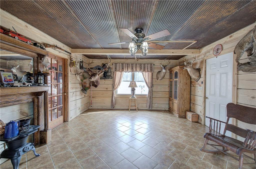 452 Terry White Road Aragon, GA 30104 - Photo 36 of 55 a view of a livingroom with furniture and a ceiling fan