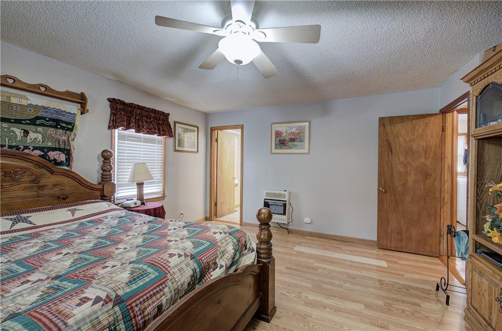 452 Terry White Road Aragon, GA 30104 - Photo 39 of 55 a bedroom with a bed dresser and a window