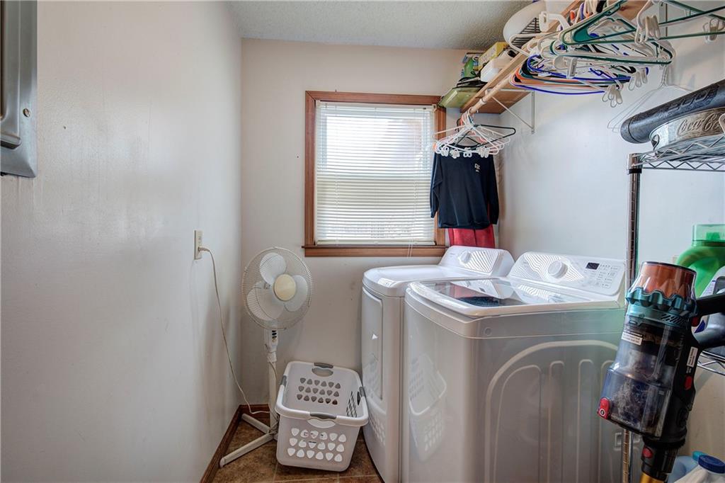 452 Terry White Road Aragon, GA 30104 - Photo 44 of 55 a view of storage and utility room with washer and dryer