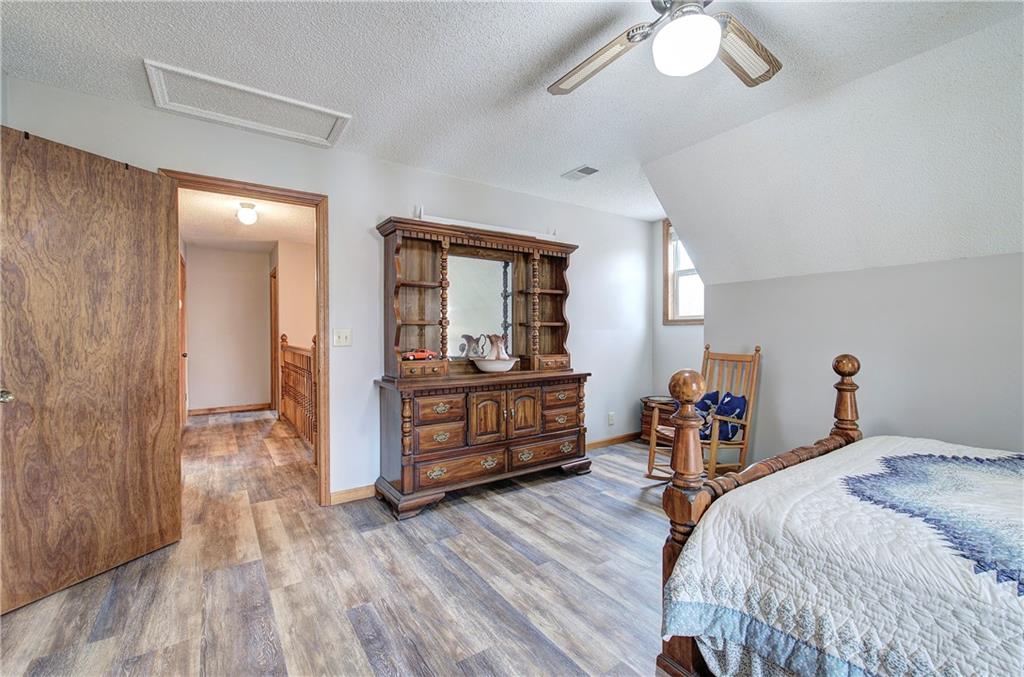 452 Terry White Road Aragon, GA 30104 - Photo 46 of 55 a bed room with a bed and dresser