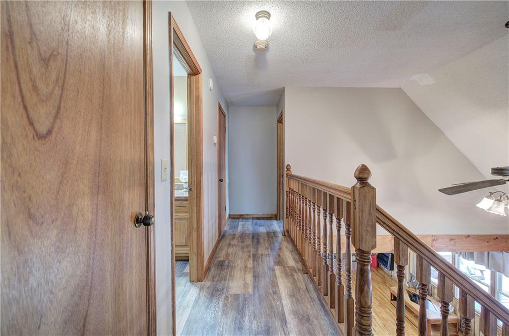 452 Terry White Road Aragon, GA 30104 - Photo 47 of 55 a view of a hallway with wooden floor and staircase