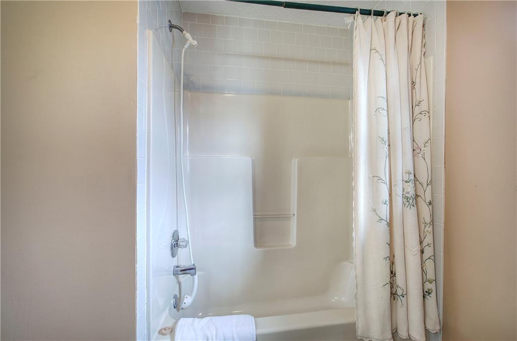 452 Terry White Road Aragon, GA 30104 - Photo 49 of 55 a bathroom with a glass shower door
