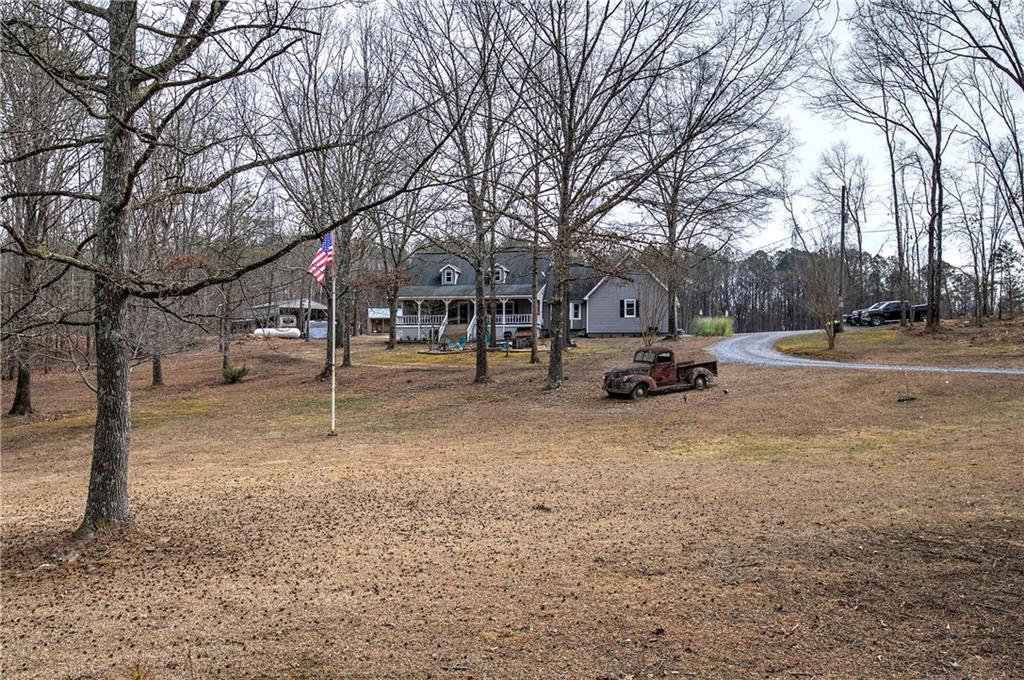 452 Terry White Road Aragon, GA 30104 - Photo 5 of 55 a car parked on the side of the road