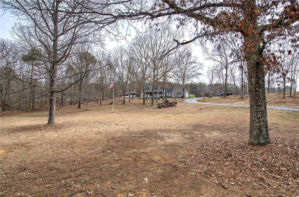 452 Terry White Road Aragon, GA 30104 - Photo 6 of 55 a view of road covered with snow