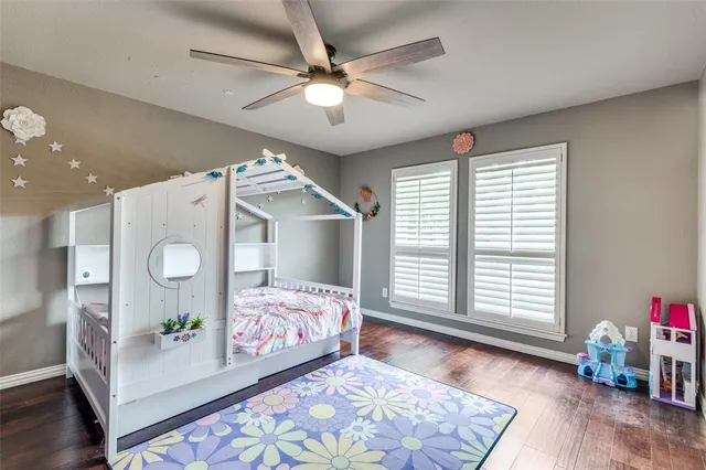 a bedroom with bed and a window