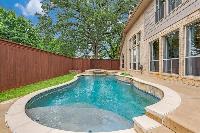 a view of outdoor space and swimming pool