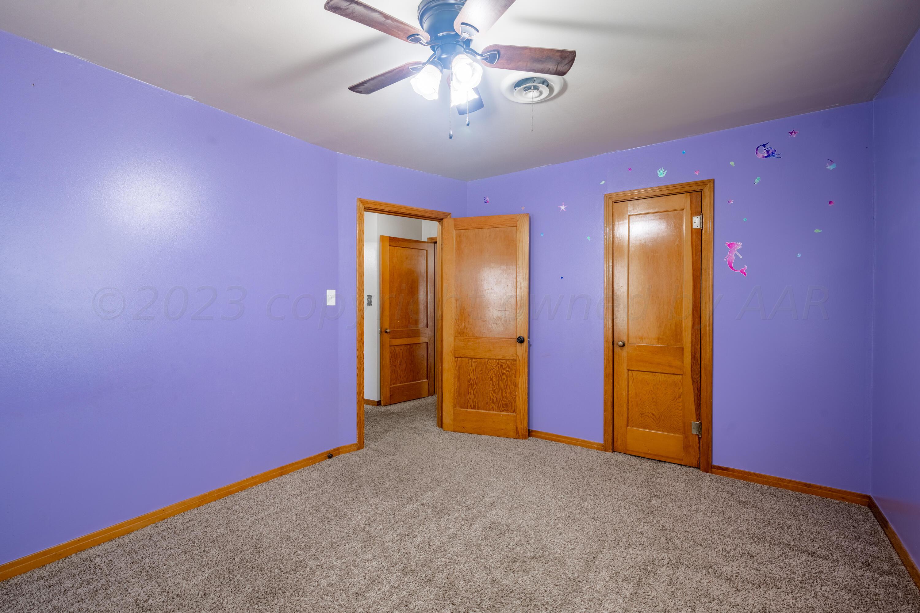 3616 South Travis Street Amarillo, TX 79110 - Photo 11 of 26 a view of empty room with window