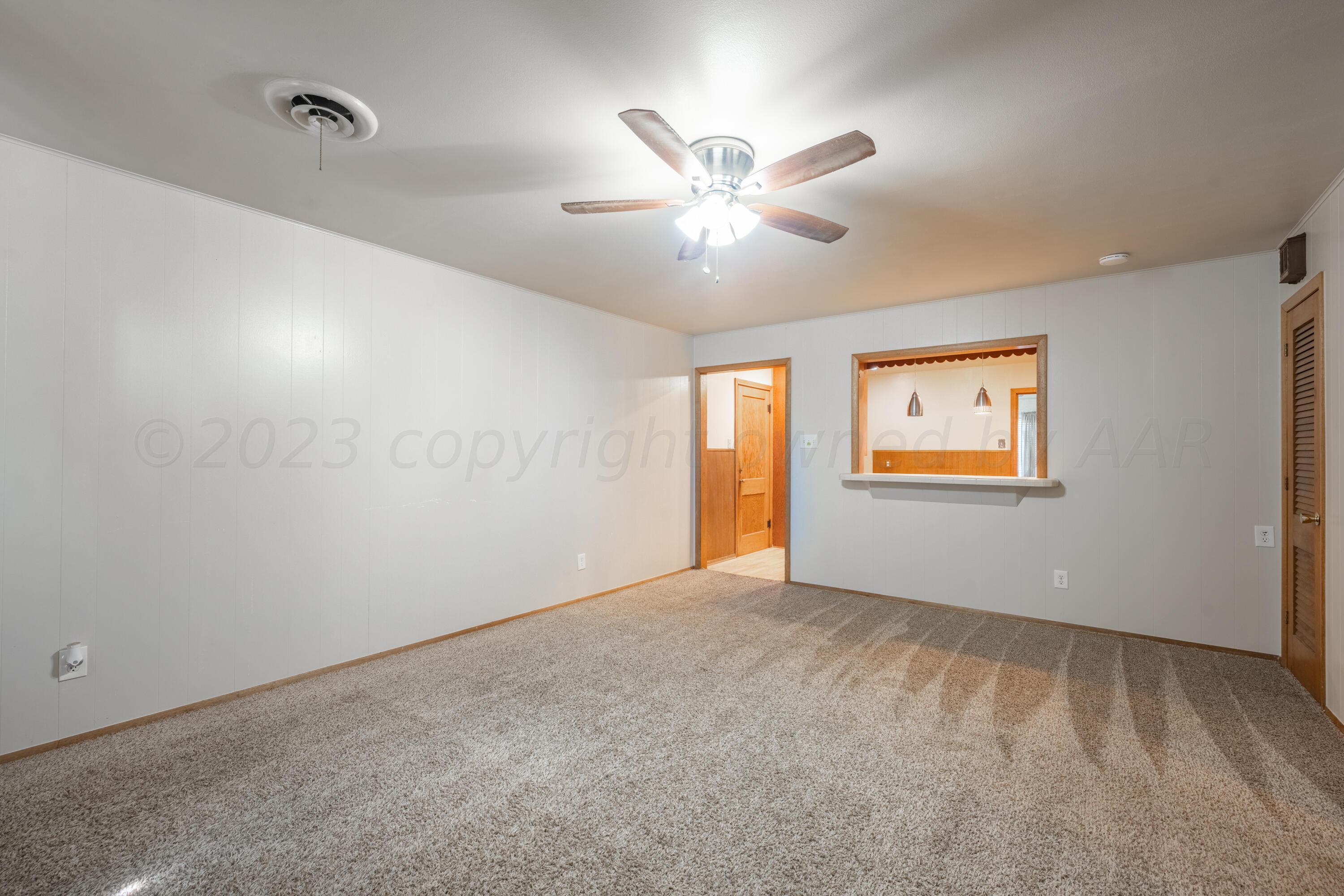 3616 South Travis Street Amarillo, TX 79110 - Photo 16 of 26 a view of an empty room with a window