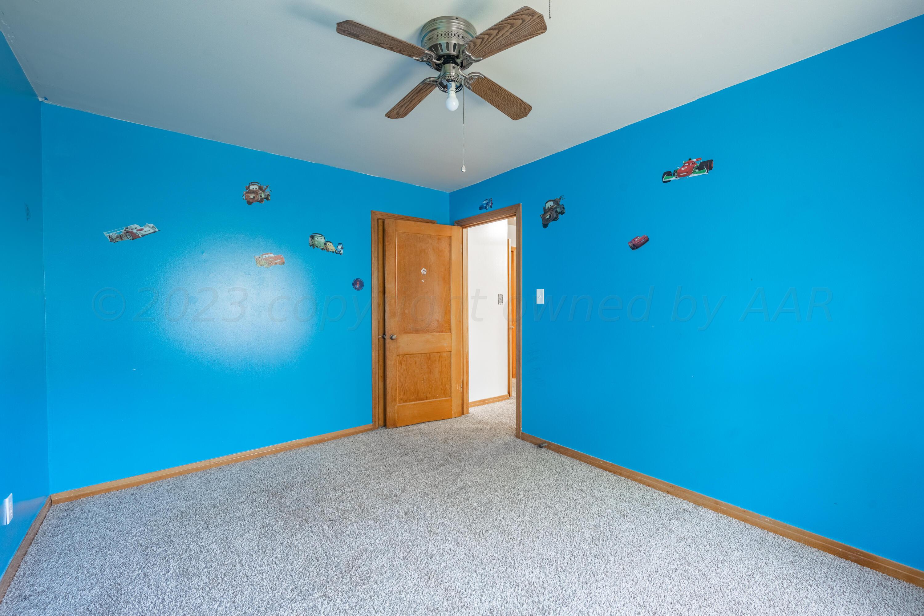3616 South Travis Street Amarillo, TX 79110 - Photo 9 of 26 a view of an empty room