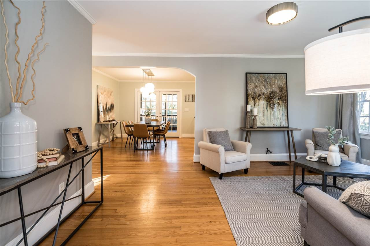 1511 Cherokee Drive Raleigh, NC 27608 - Photo 29 of 30 Wow! You will love this home the minute you walk into the living room! Sellers worked with Frank Harmon Architects when they first moved in to redesign the floor plan. Entry