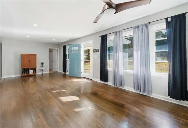 a view of a livingroom with a staircase