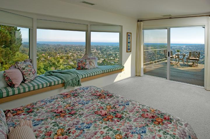 51 Loma Media Road Santa Barbara, CA 93103 - Photo 5 of 6 a living room filled with furniture and a floor to ceiling window