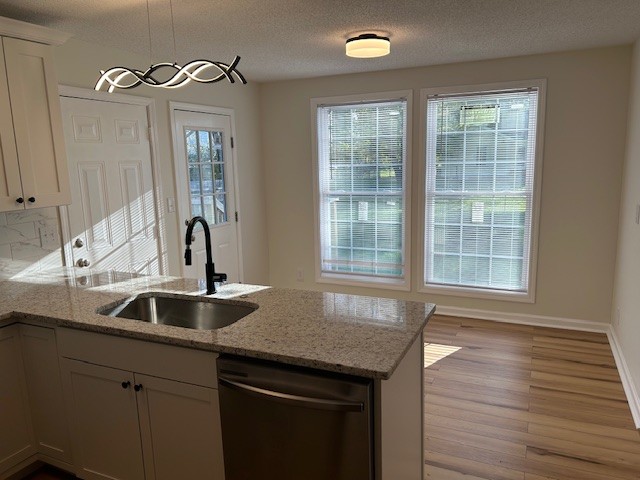 3403 Chaney Lane Clarksville, TN 37042 - Photo 2 of 28 a kitchen with a sink and wooden floor