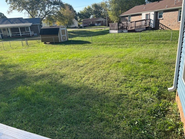 3403 Chaney Lane Clarksville, TN 37042 - Photo 23 of 28 a view of a house with a back yard