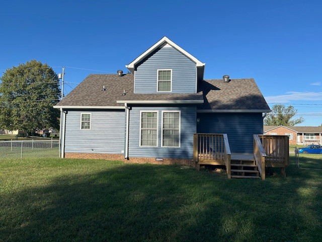 3403 Chaney Lane Clarksville, TN 37042 - Photo 26 of 28 a front view of a house with a garden and yard
