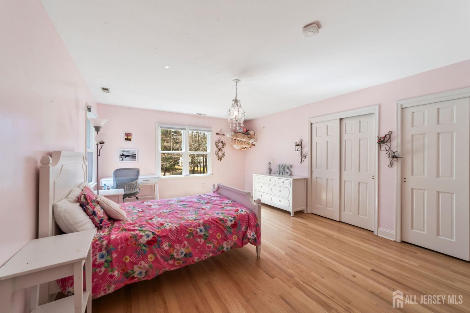 325 Spring Hill Road Skillman, NJ 08558 - Photo 25 of 46 a bedroom with a bed and a window