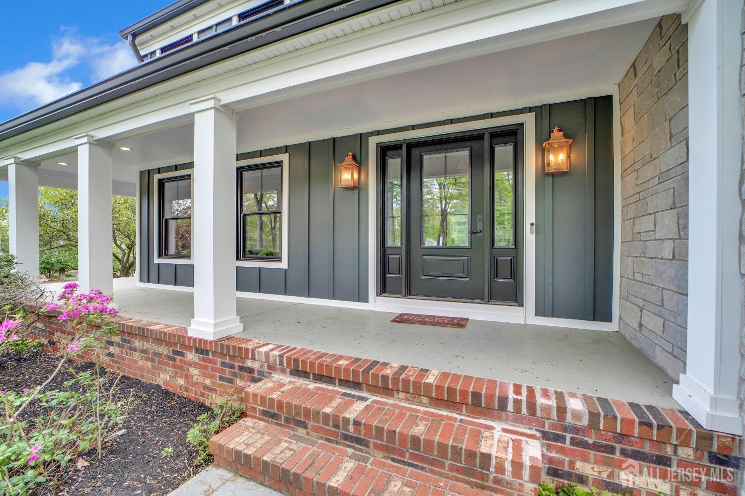 325 Spring Hill Road Skillman, NJ 08558 - Photo 3 of 46 a view of a house with a porch
