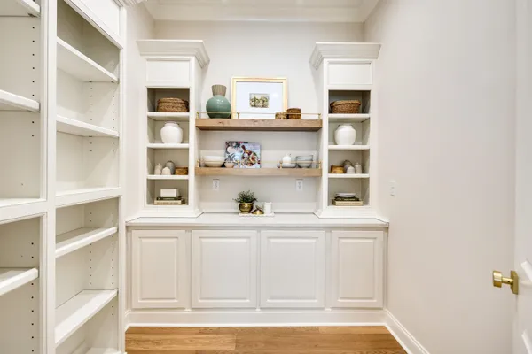 a room with a book shelf