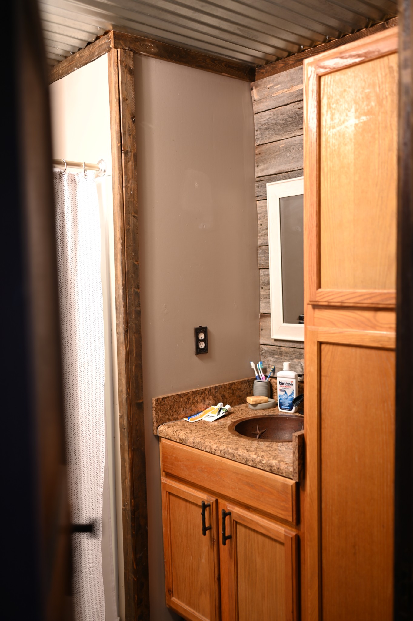 10996 Shelbyville Road Morrison, TN 37357 - Photo 23 of 26 a bathroom with a granite countertop sink and a window