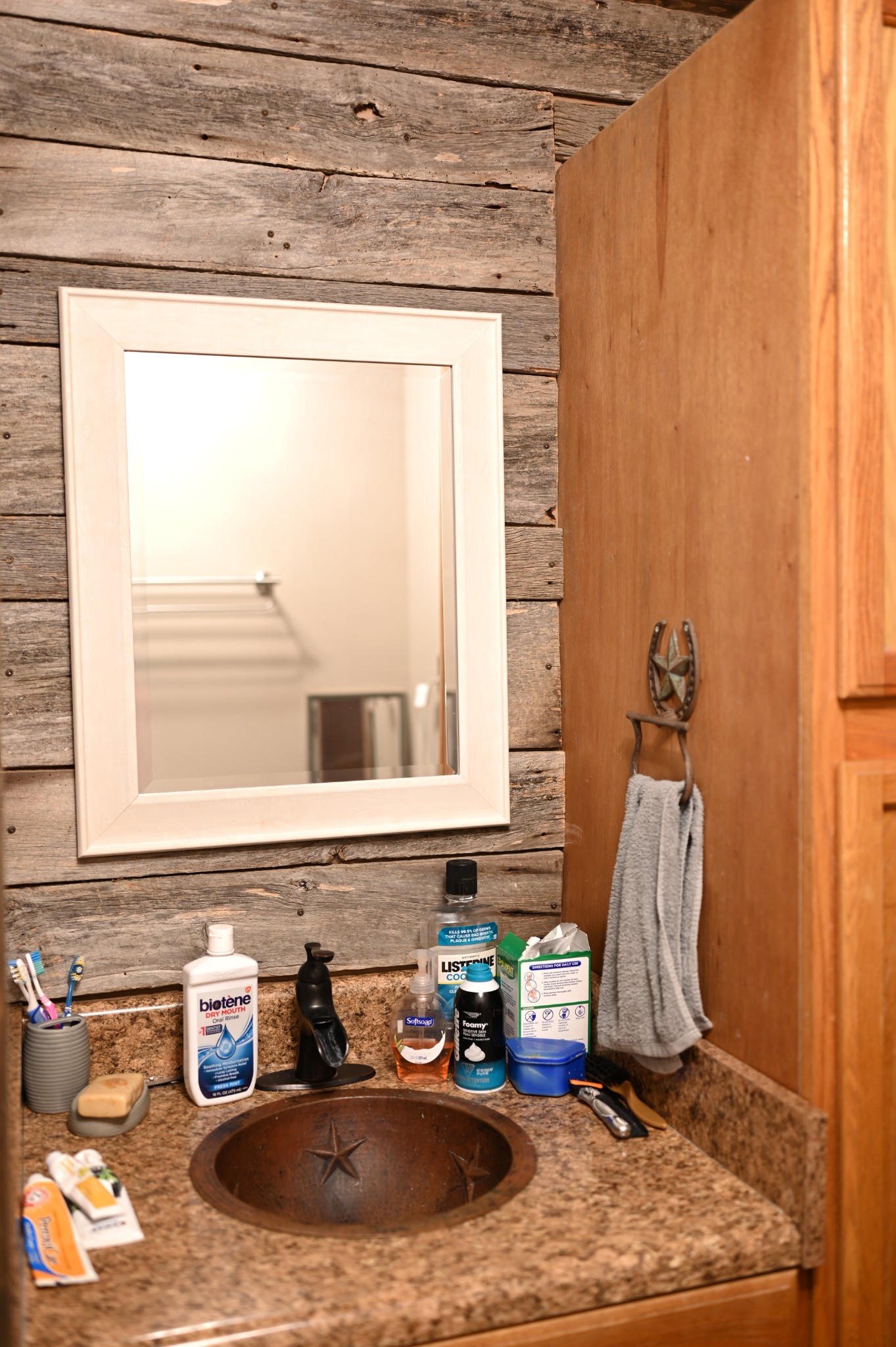 10996 Shelbyville Road Morrison, TN 37357 - Photo 24 of 26 a bathroom with a sink and a mirror