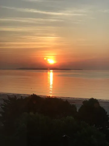 a view of a city with tall buildings