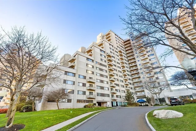 a view of a street with an ocean view