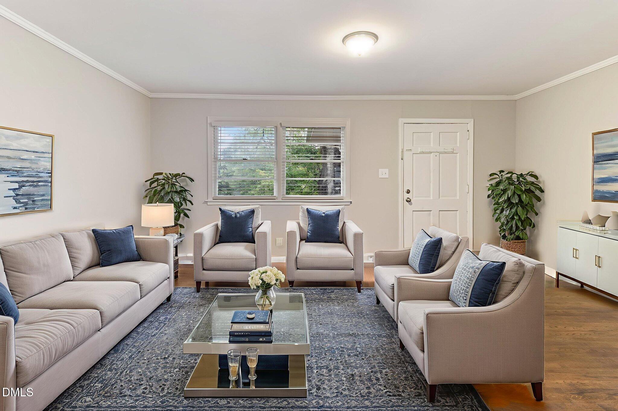 1814 House Avenue, Unit A Durham, NC 27707 - Photo 3 of 12 a living room with furniture or couch and a potted plant