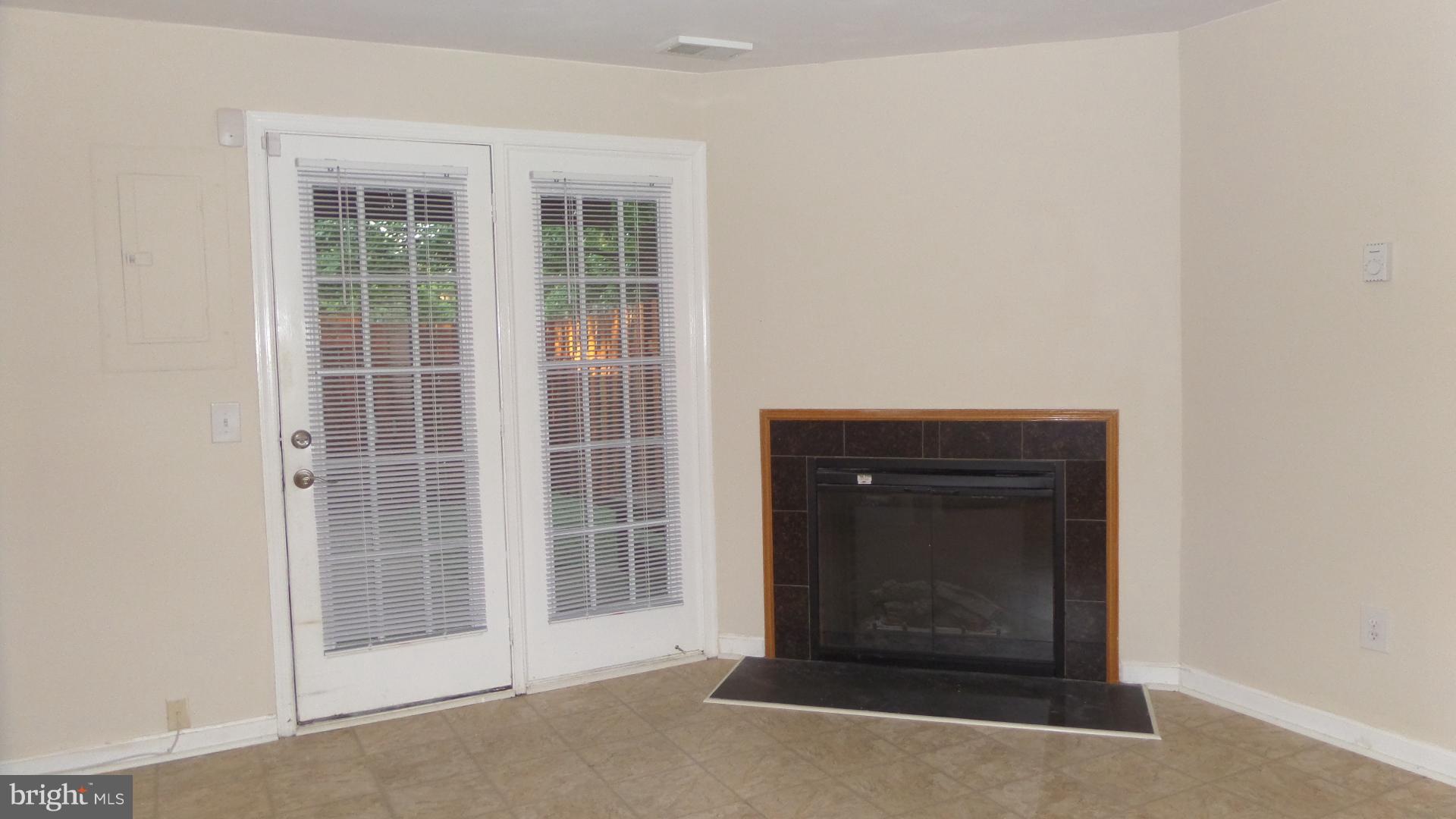 3004 Kings Village Road Alexandria, VA 22306 - Photo 18 of 22 Electric FP in Family Room (has gas connection)