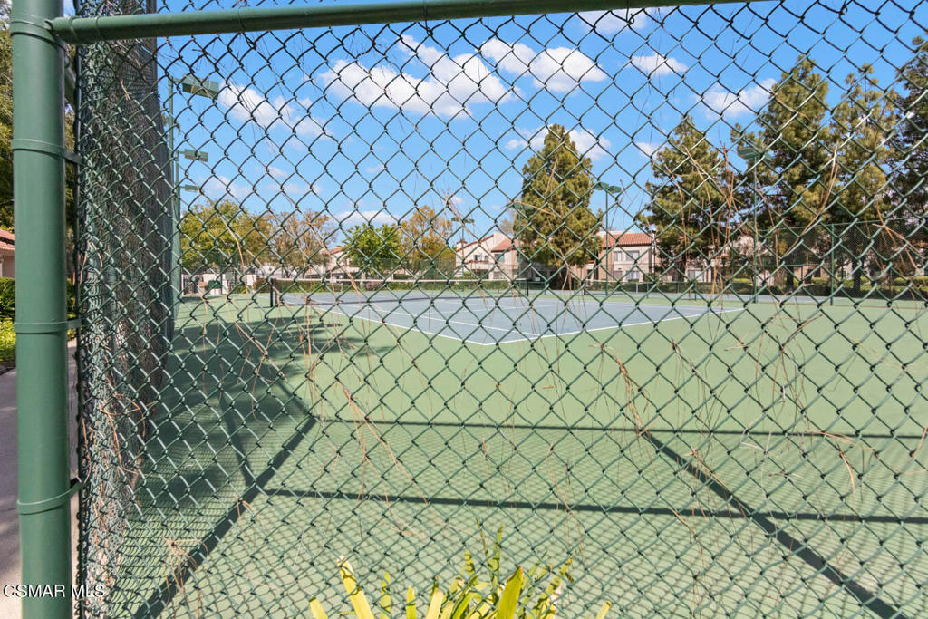 1754 Sinaloa Road, Unit 271 Simi Valley, CA 93065 - Photo 19 of 20 a bathroom with a sink and a shower curtain