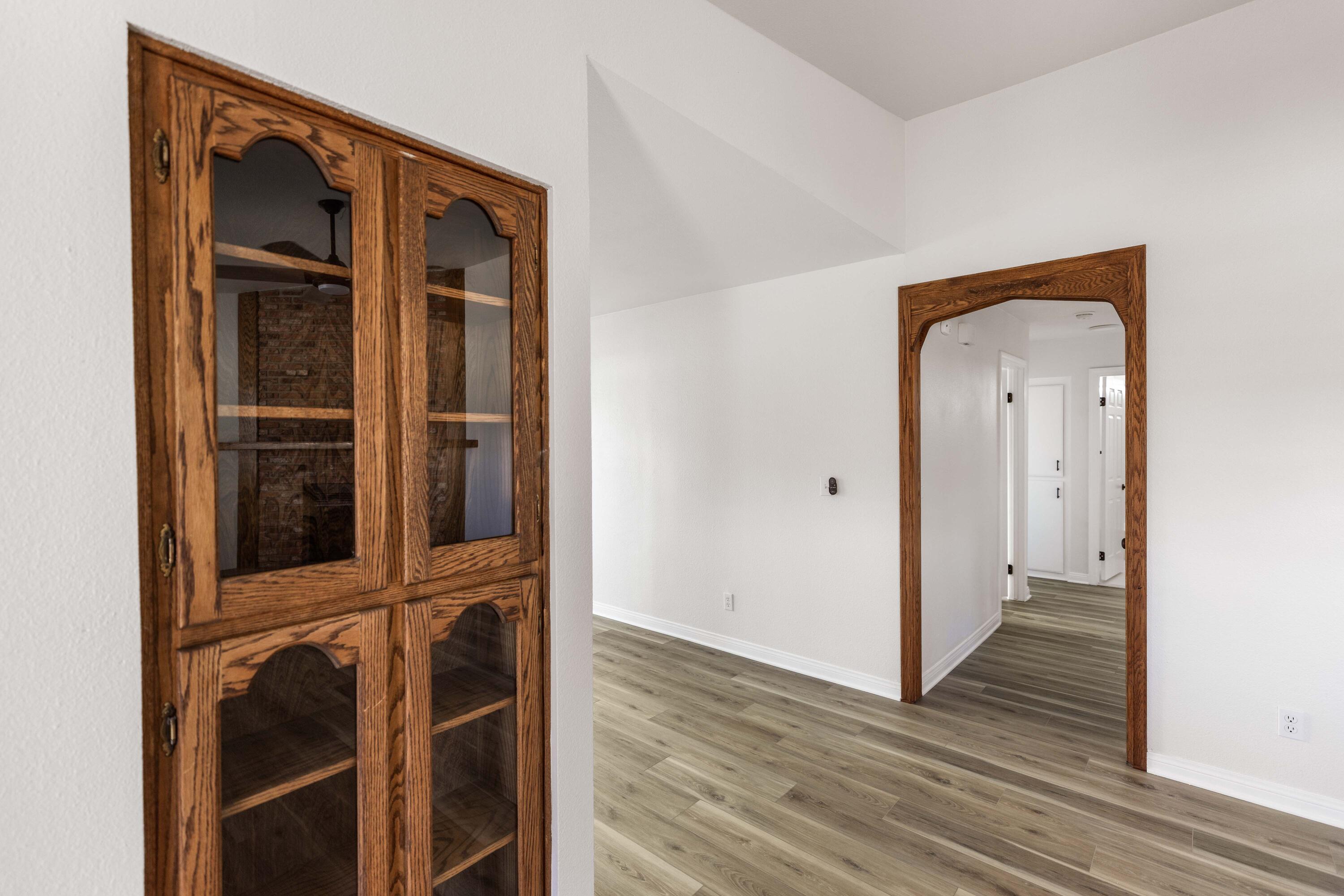 43734 Frieda Court Lancaster, CA 93535 - Photo 15 of 32 a view of a hallway with wooden floor and entryway