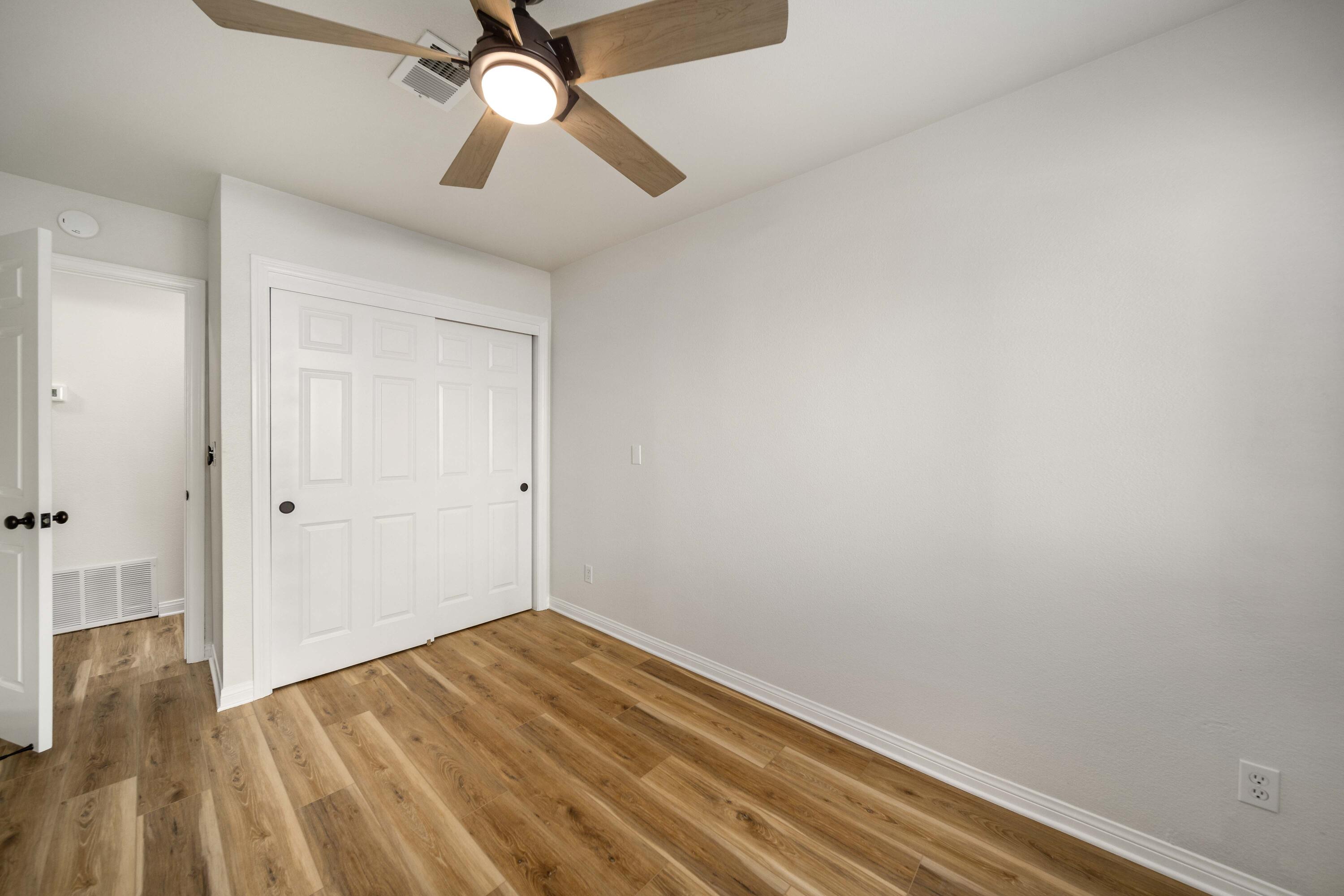 43734 Frieda Court Lancaster, CA 93535 - Photo 17 of 32 a view of empty room with wooden floor