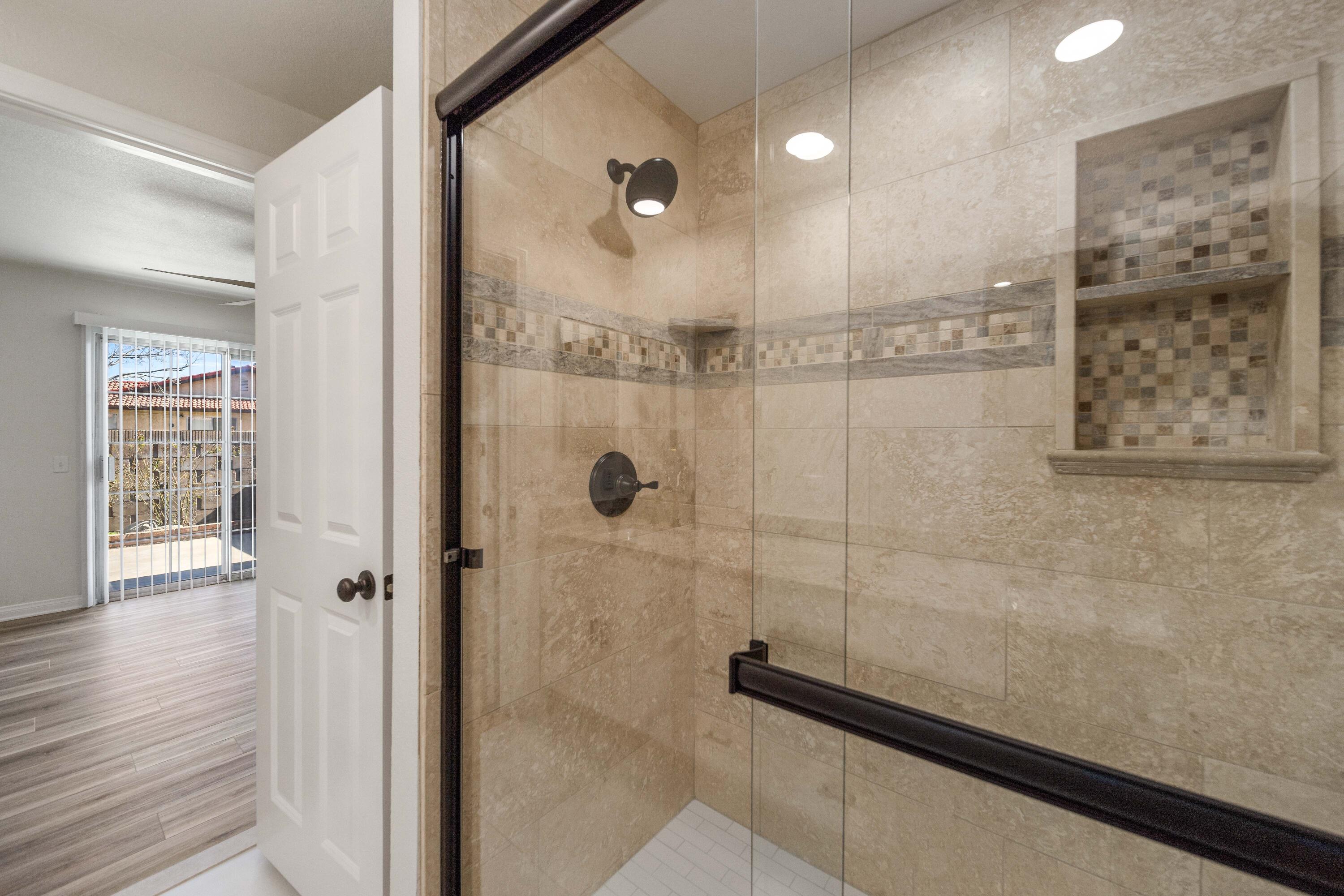 43734 Frieda Court Lancaster, CA 93535 - Photo 25 of 32 a bathroom with a shower