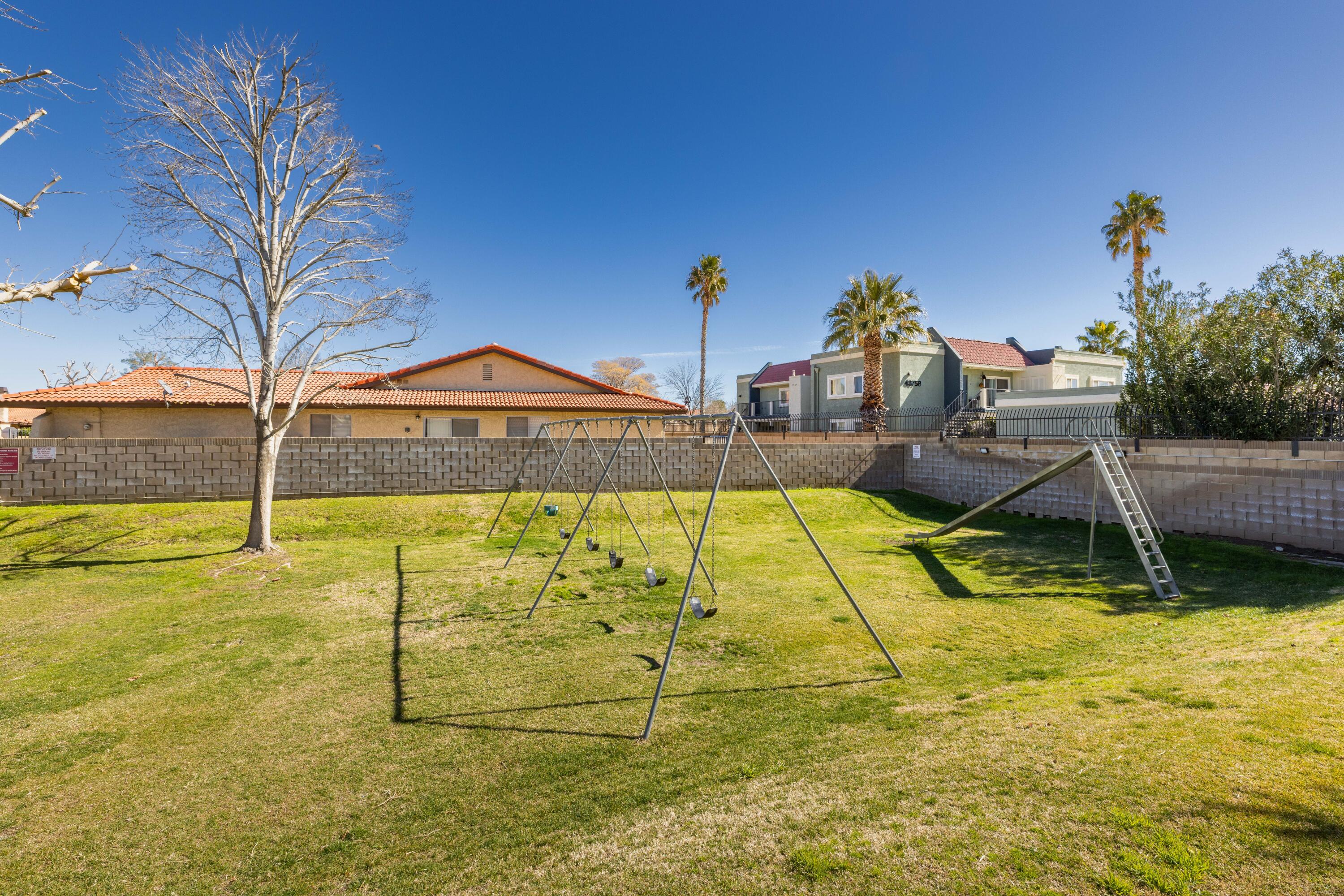 43734 Frieda Court Lancaster, CA 93535 - Photo 30 of 32 a view of swimming pool with seating area