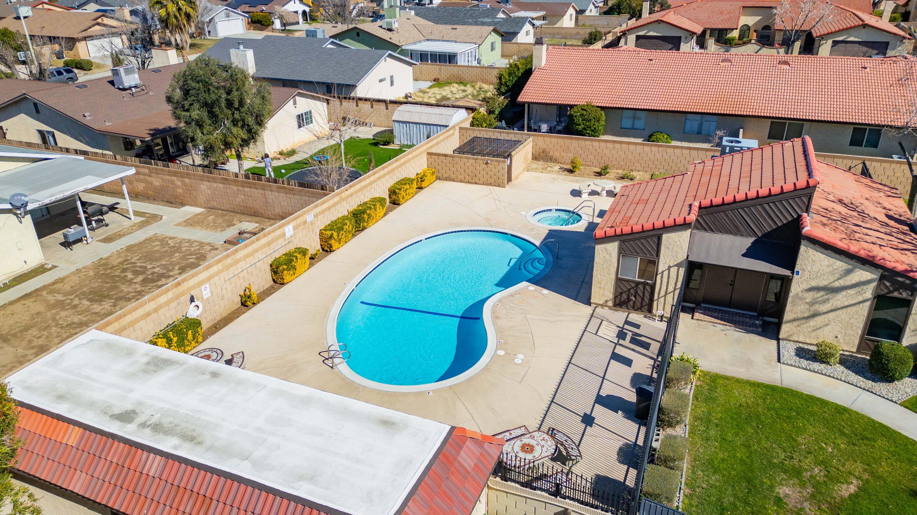 43734 Frieda Court Lancaster, CA 93535 - Photo 31 of 32 an aerial view of a house with swimming pool and outdoor seating