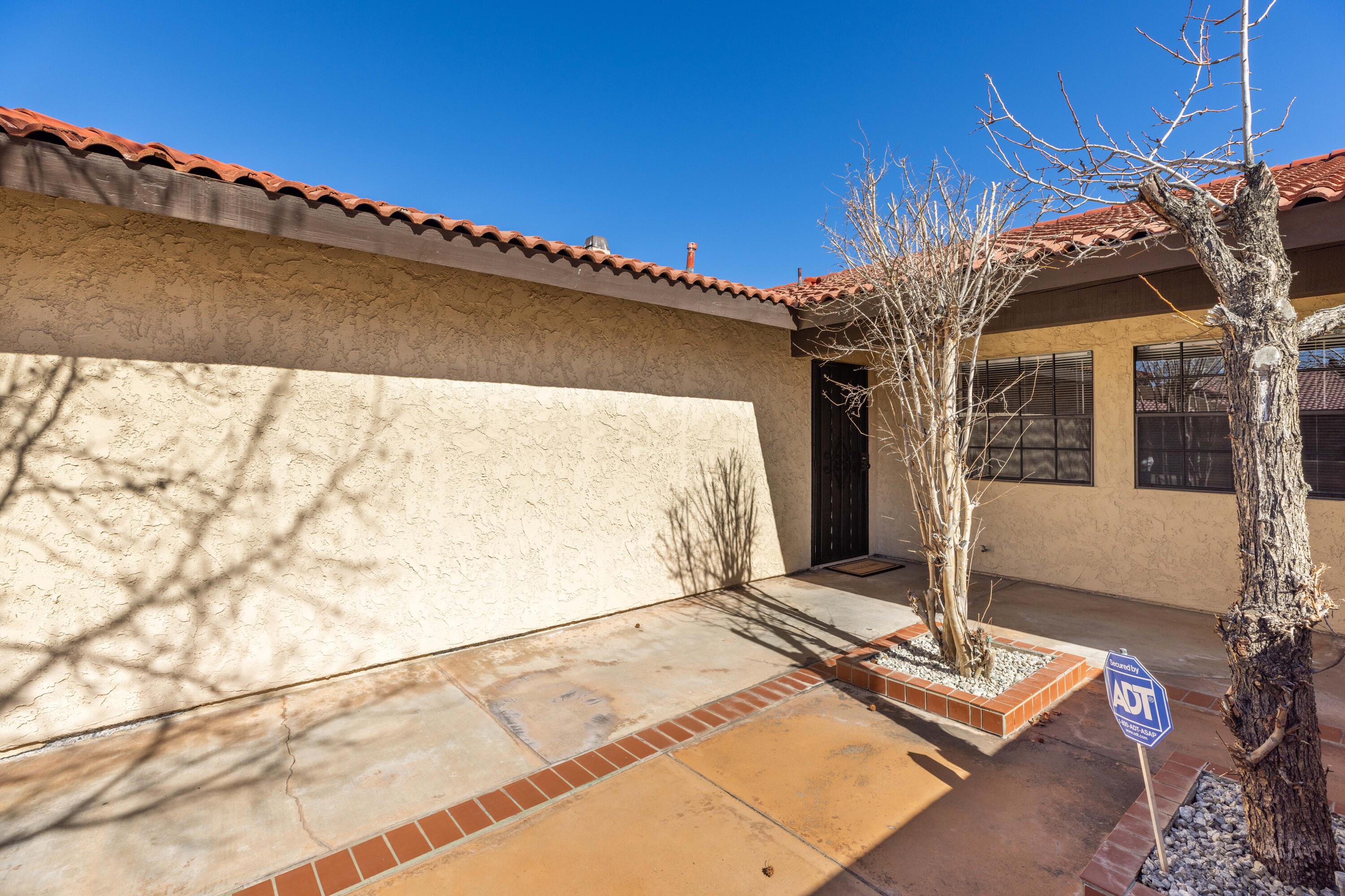 43734 Frieda Court Lancaster, CA 93535 - Photo 4 of 32 a front view of a house with a yard