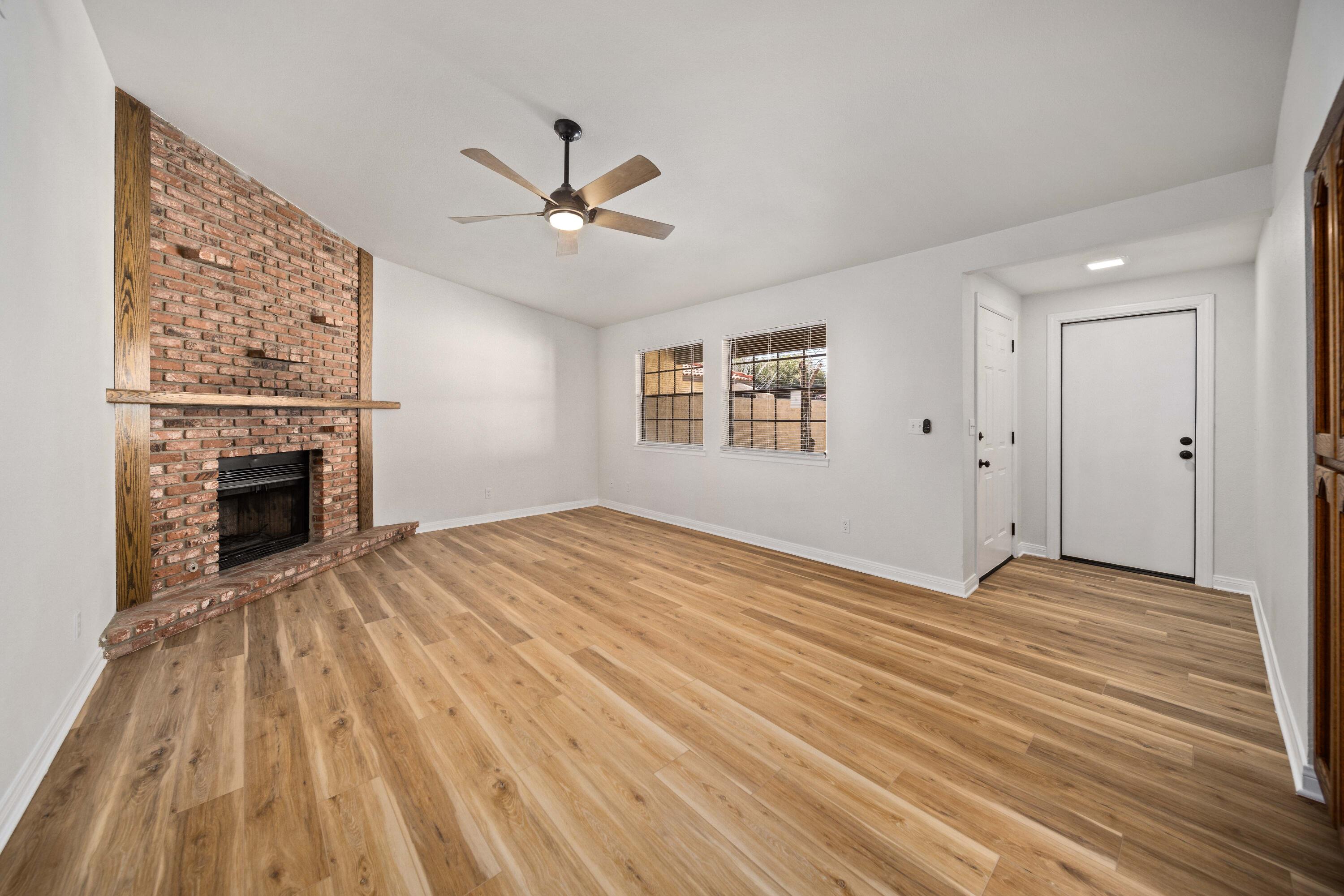 43734 Frieda Court Lancaster, CA 93535 - Photo 5 of 32 a view of empty room with wooden floor and fan