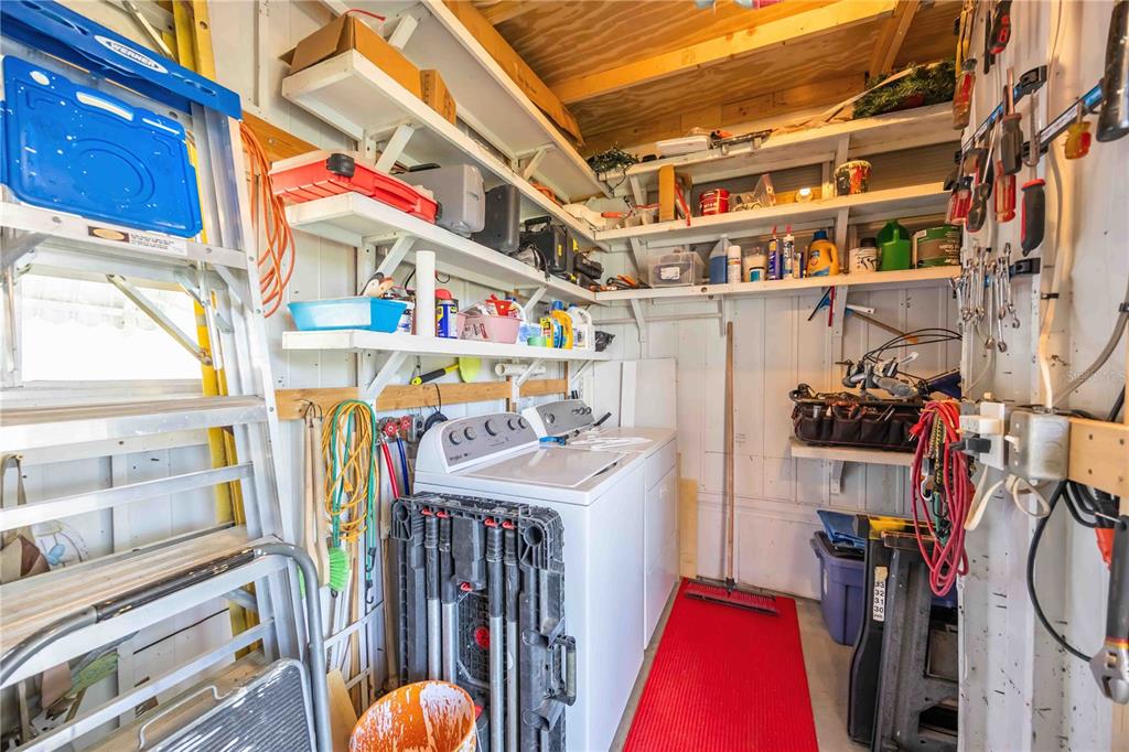 10303 Burnt Store Road, Unit 221 Punta Gorda, FL 33950 - Photo 21 of 31 a utility room with dryer and washer