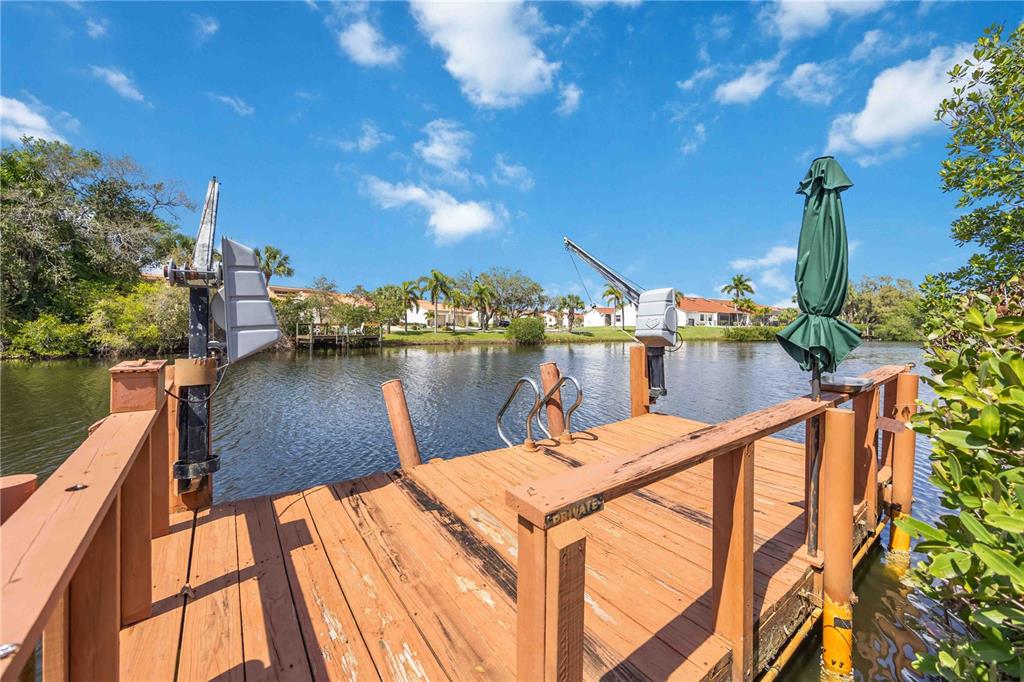 10303 Burnt Store Road, Unit 221 Punta Gorda, FL 33950 - Photo 25 of 31 a view of a balcony and lake view