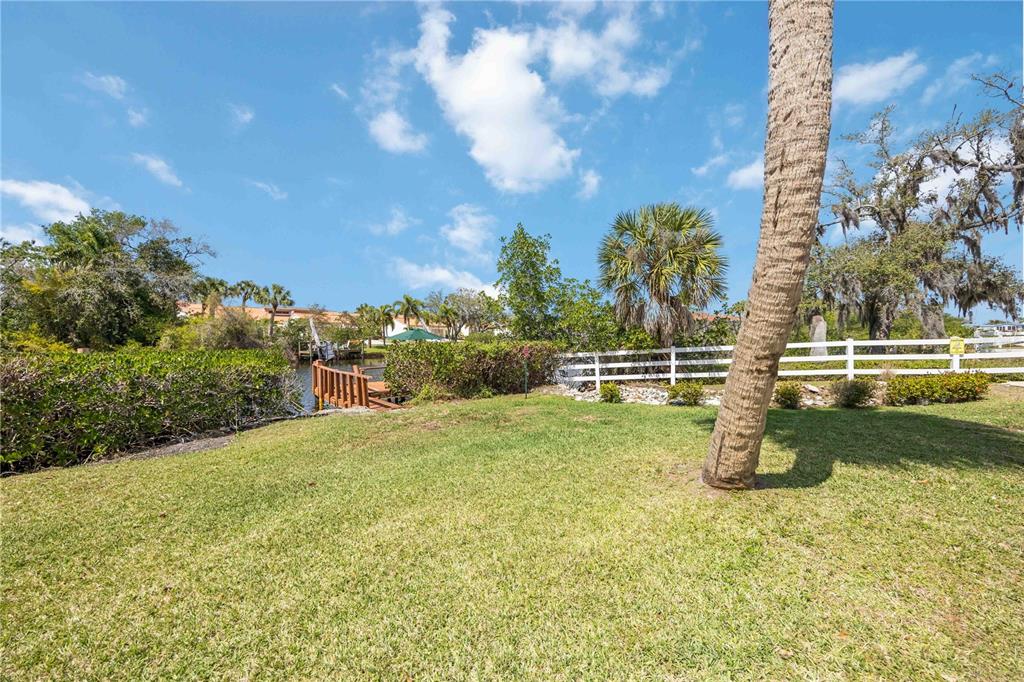 10303 Burnt Store Road, Unit 221 Punta Gorda, FL 33950 - Photo 27 of 31 a view of a garden