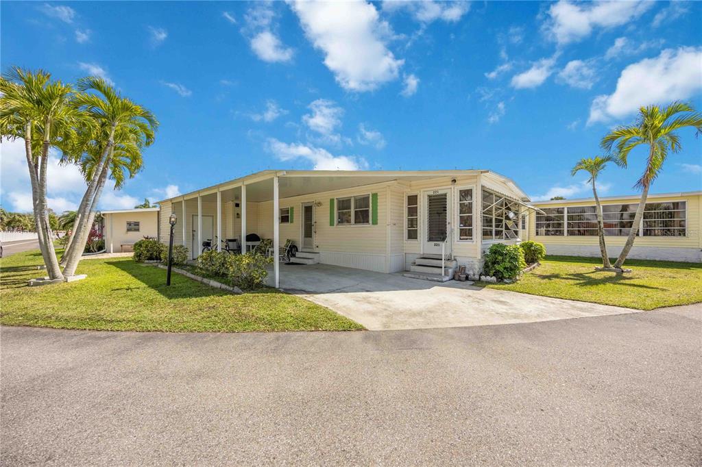 10303 Burnt Store Road, Unit 221 Punta Gorda, FL 33950 - Photo 28 of 31 a view of a house with basketball court