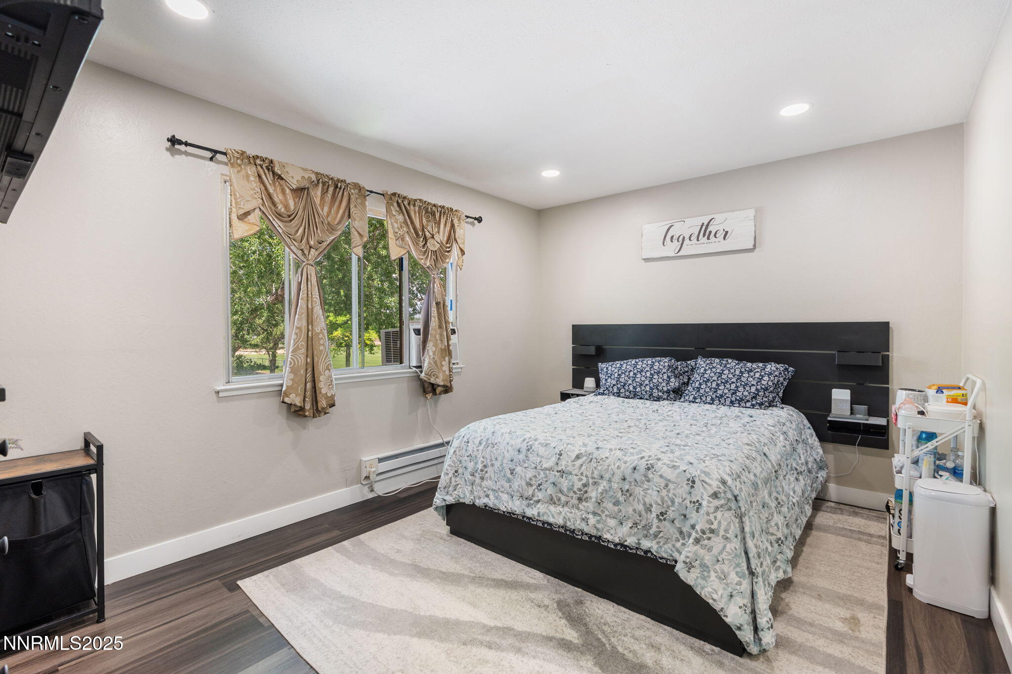 940 Jamaica Avenue, Unit 3 Reno, NV 89502 - Photo 20 of 29 a bedroom with a large bed and a window