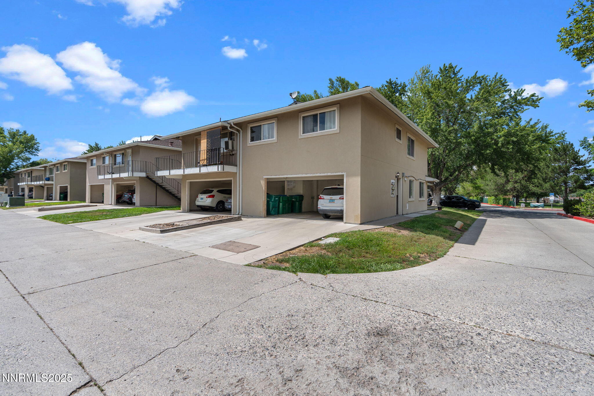940 Jamaica Avenue, Unit 3 Reno, NV 89502 - Photo 25 of 29 a front view of a house with a yard and garage